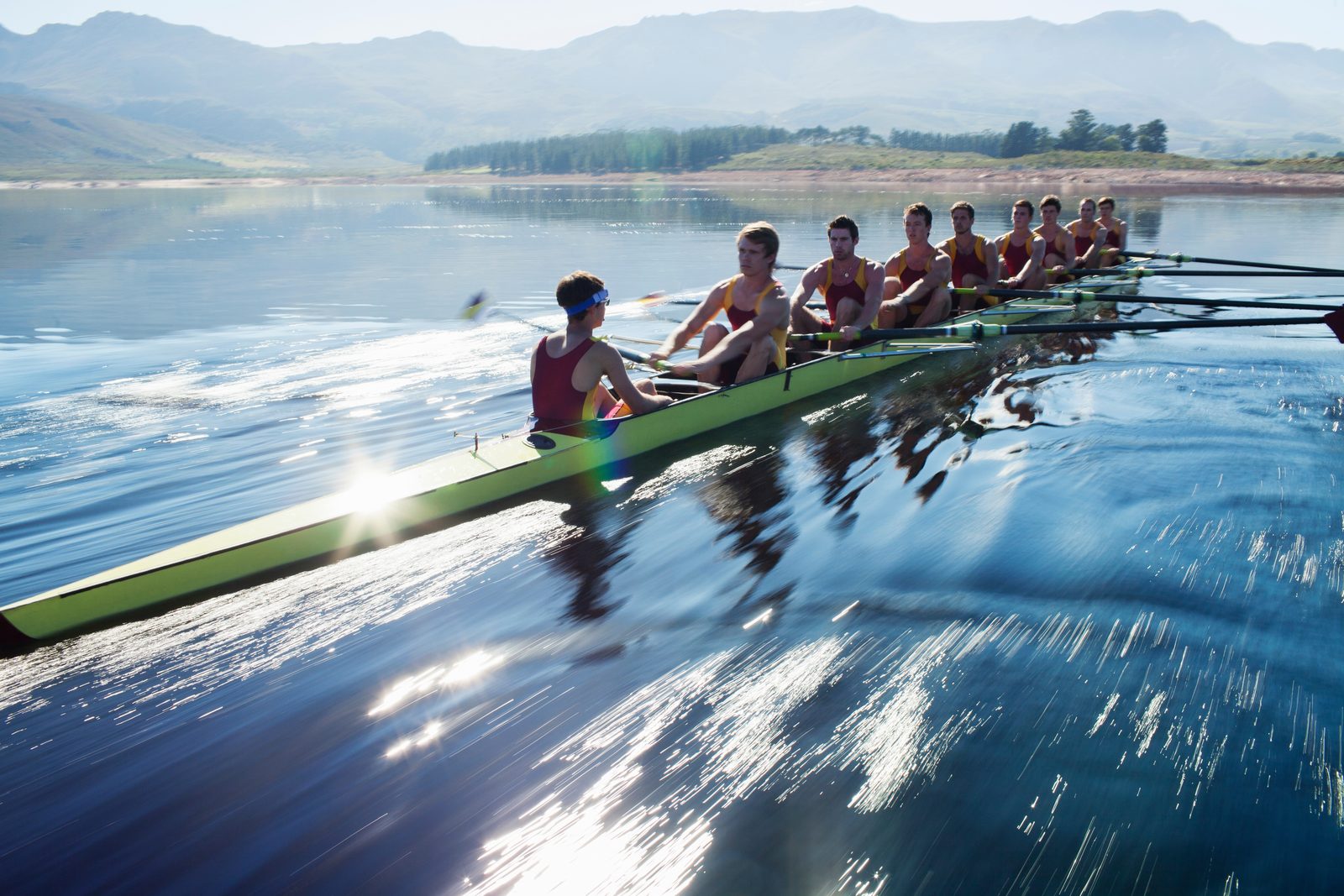 A rowing crew, all eight rowers in perfect sync